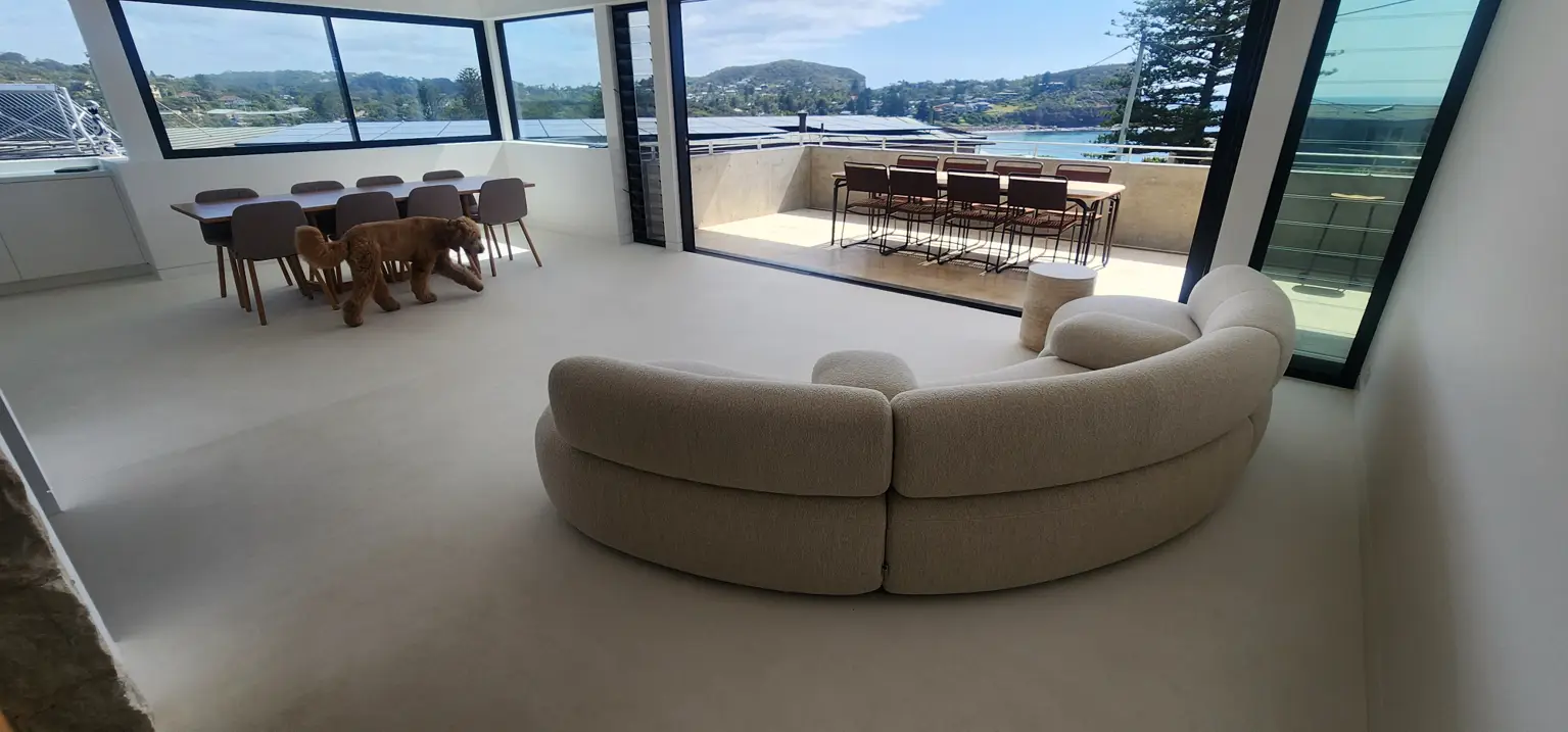 Residential micro-cement flooring in Avalon home renovation